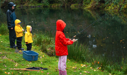 three children fishing