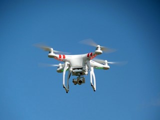 drone in sky viewed from below