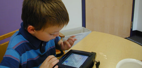 child using speech generating device